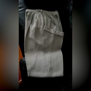 pleated dress trousers, side pockets, zippered front & one button on waistband